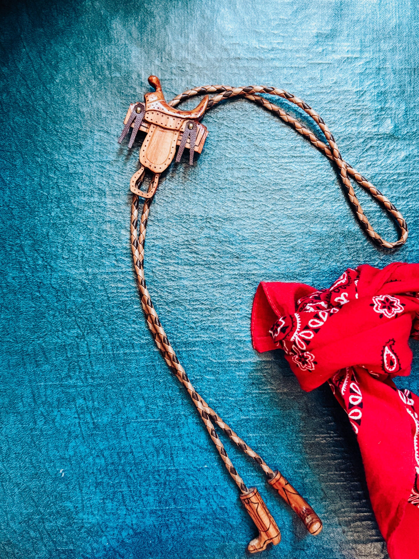 Wooden Saddle Bolo Tie with Boot Tips